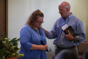 Pastor Rob Pendley prays for Julie Stout during our 8/24/14 worship service.